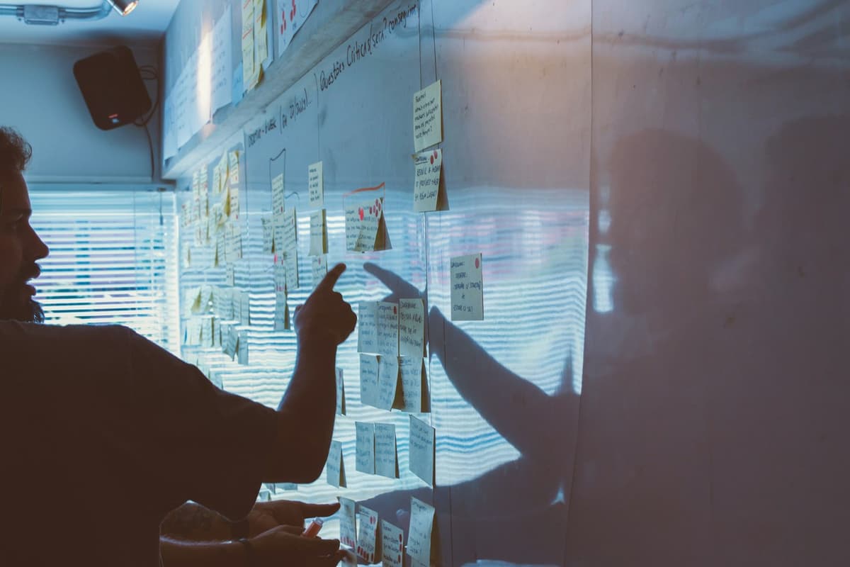 A fractional product leader reviewing a roadmap with a founder in a strategy meeting